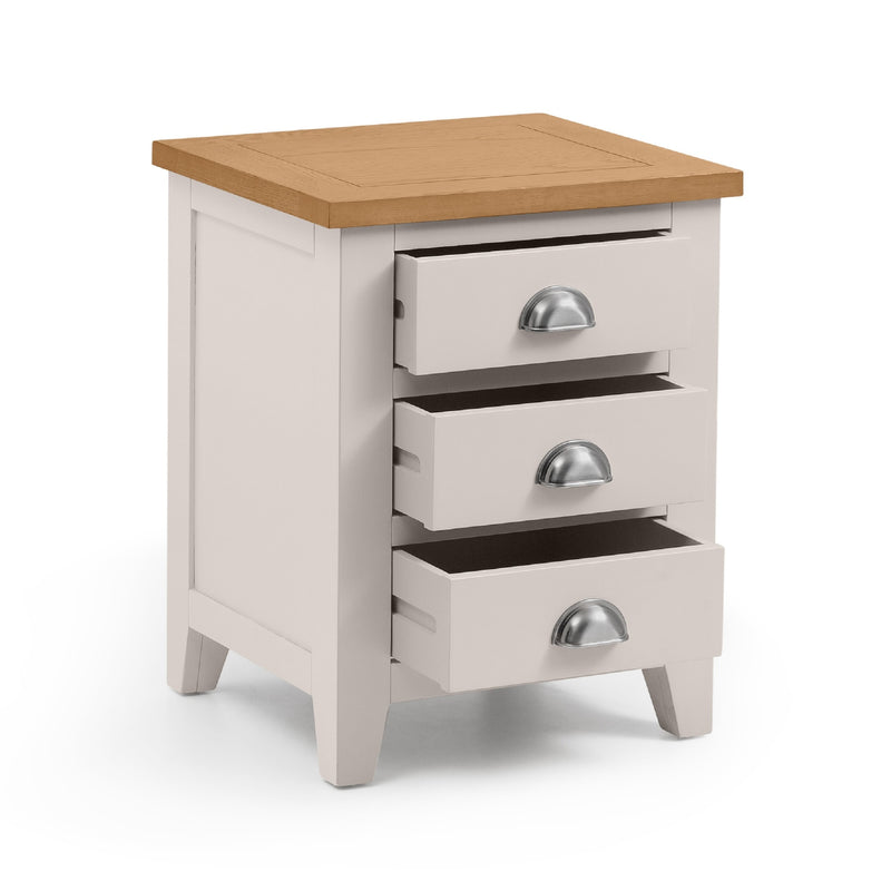 Wooden nightstand with three drawers on a white background