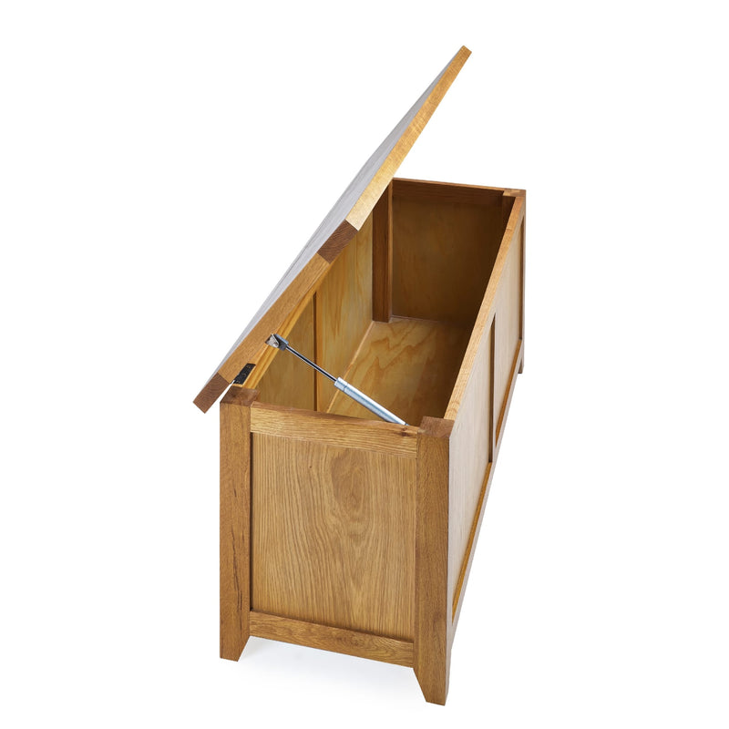 Wooden trash bin with a lid on a white background