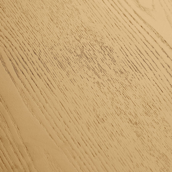 Close-up of a beige wooden surface with a subtle grain pattern