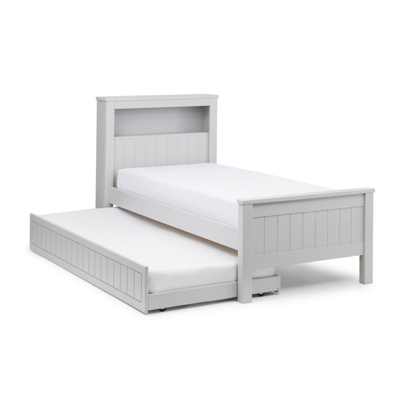 White bed with pull-out trundle on a white background