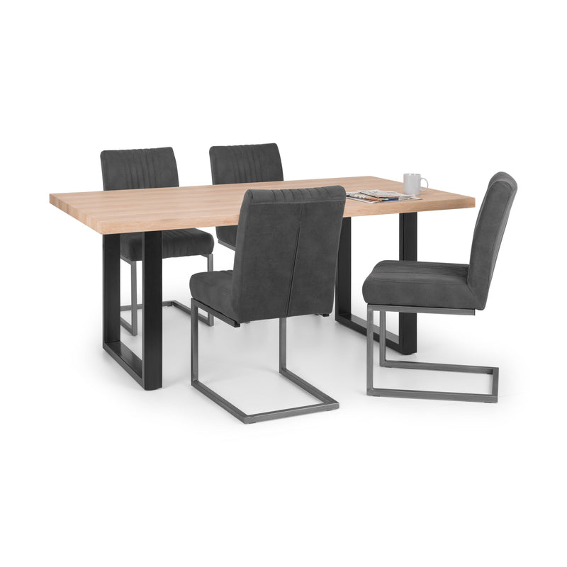 Dining table set with four gray chairs on a white background