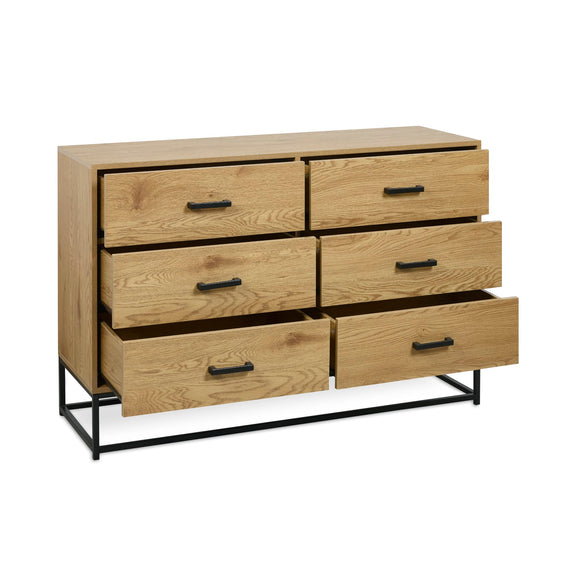 Wooden dresser with six drawers and black metal legs on a white background