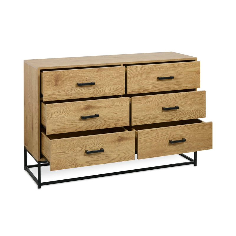 Wooden dresser with six drawers and black metal legs on a white background