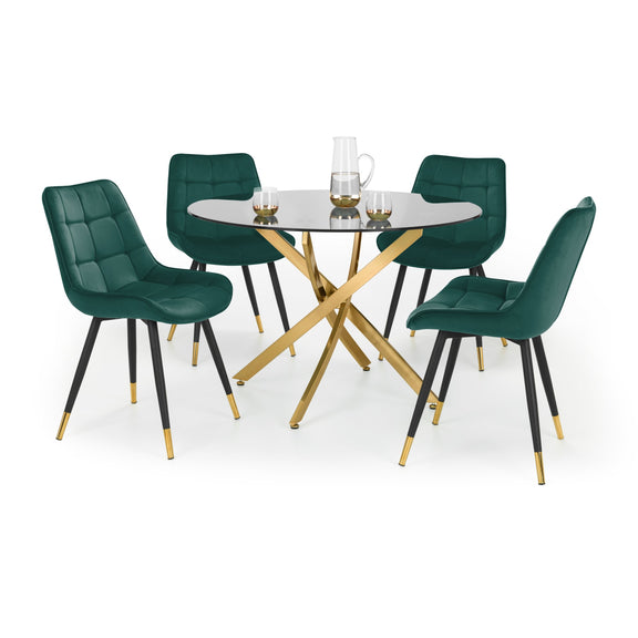 Dining set with green chairs and a gold table on a white background