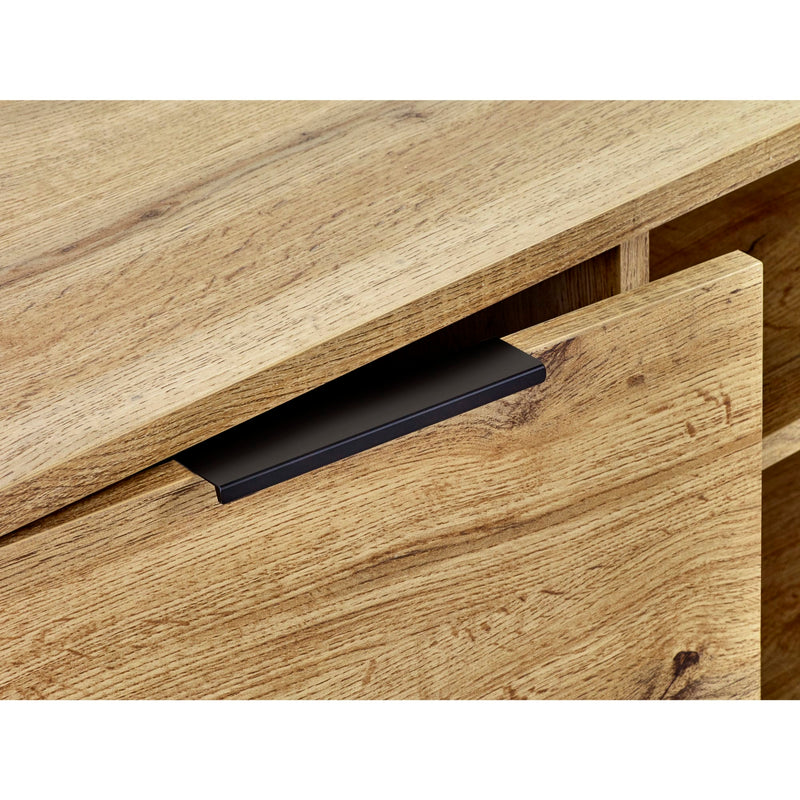 Wooden drawer with a black handle on a wooden surface