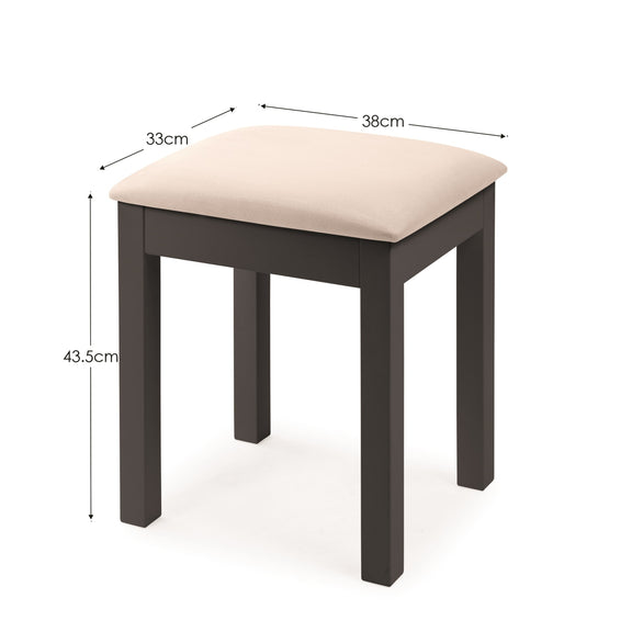 Stool with beige cushion and dimensions labeled on a white background