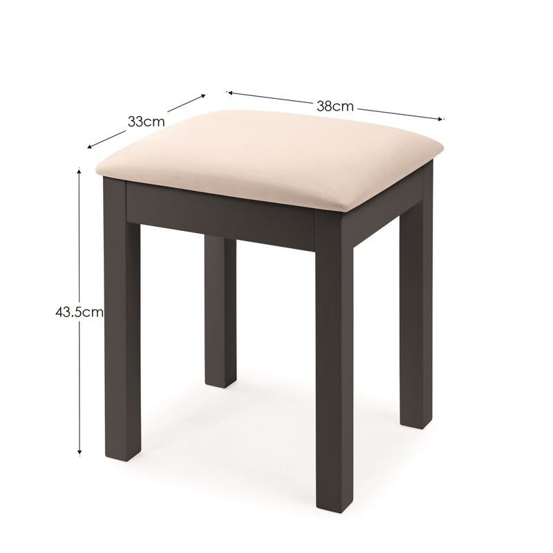 Stool with beige cushion and dimensions labeled on a white background