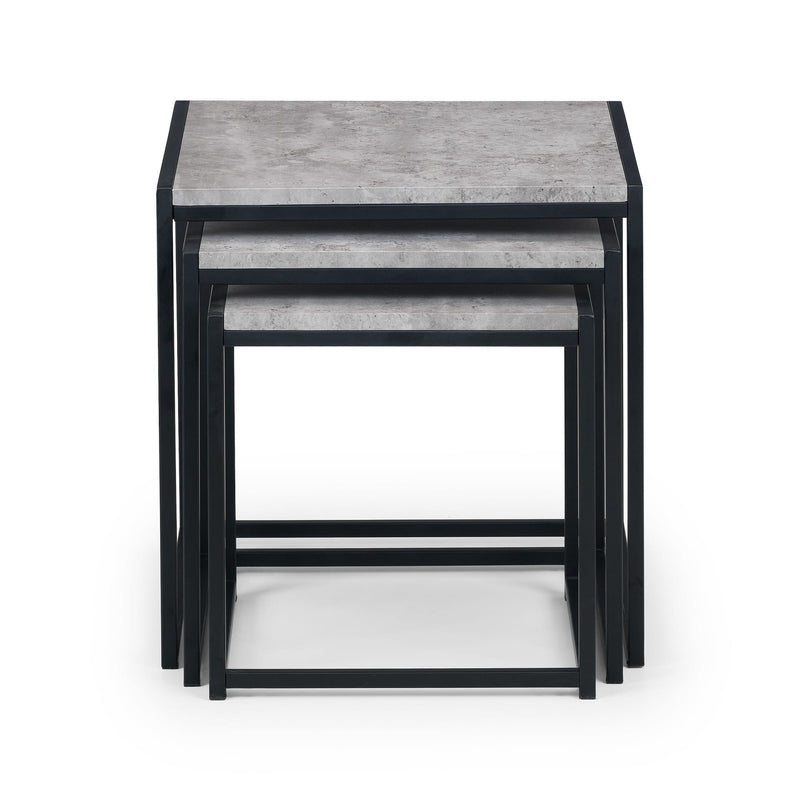 Set of three nesting tables with gray marble-like tops and black metal frames on a white background