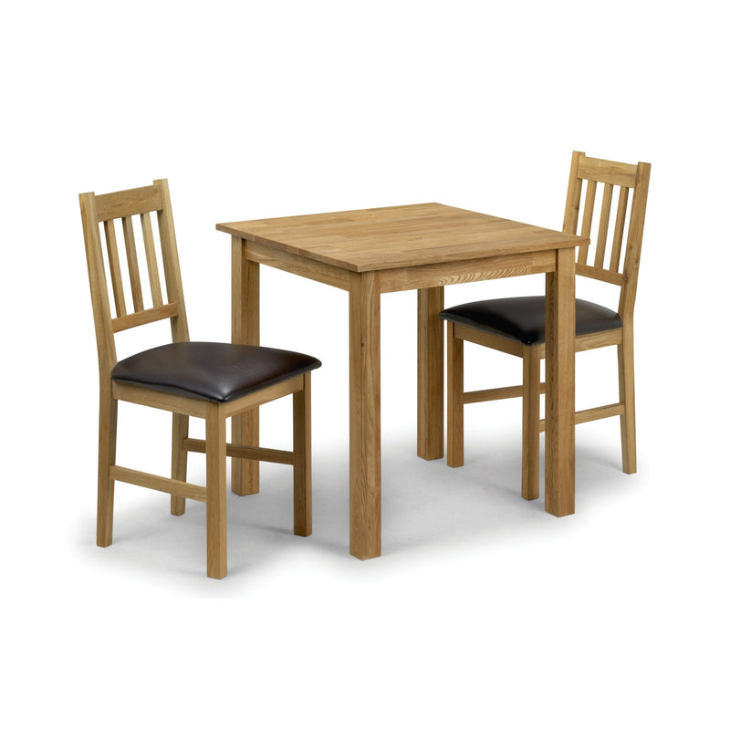 Wooden dining table with two chairs on a white background
