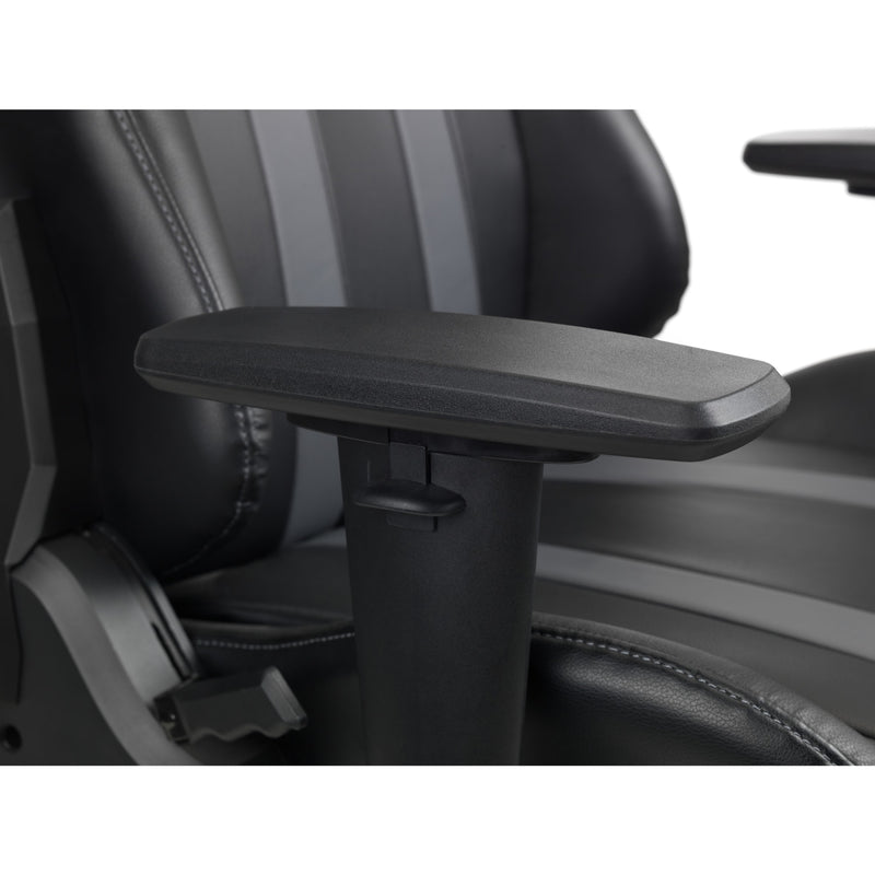 Car seat armrest with a small table extension on a gray car interior background