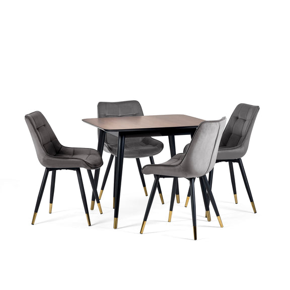 Dining table set with four gray chairs on a white background
