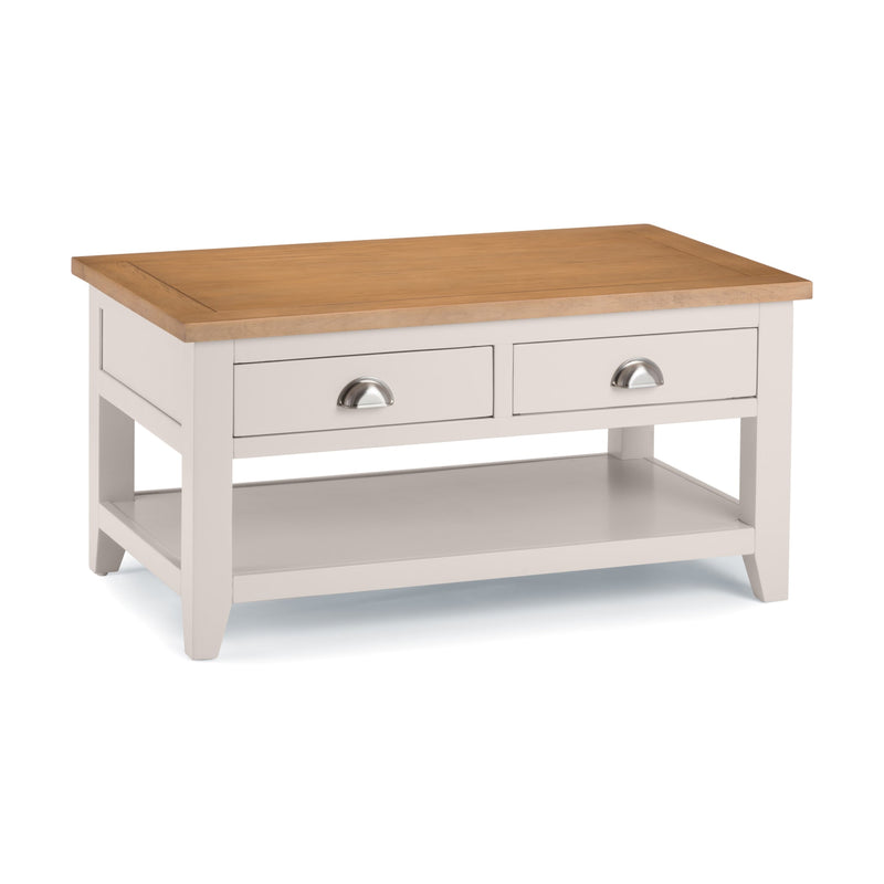 Wooden coffee table with white base on a white background