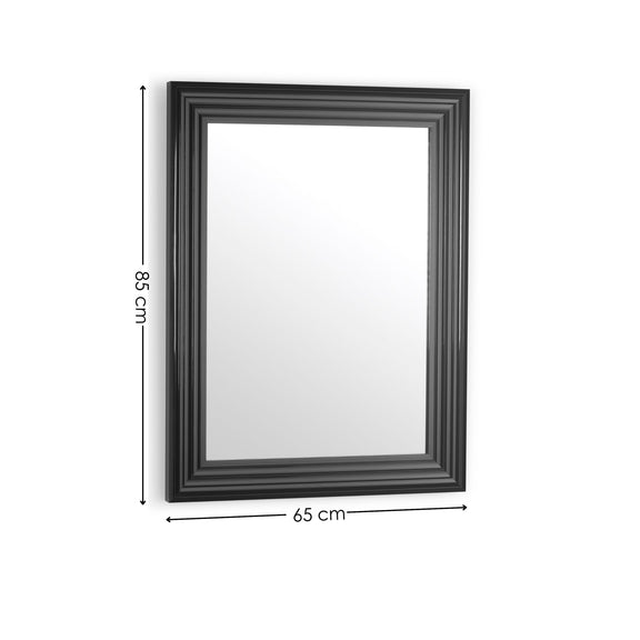 Rectangular mirror with black frame and dimensions on a white background