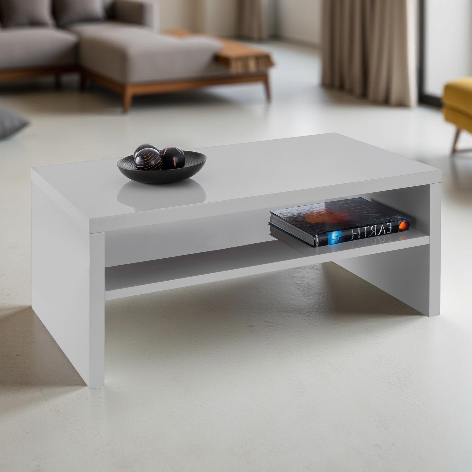 White coffee table with a shelf in a living room setting
