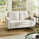 Light gray sofa in a living room setting with decor elements.