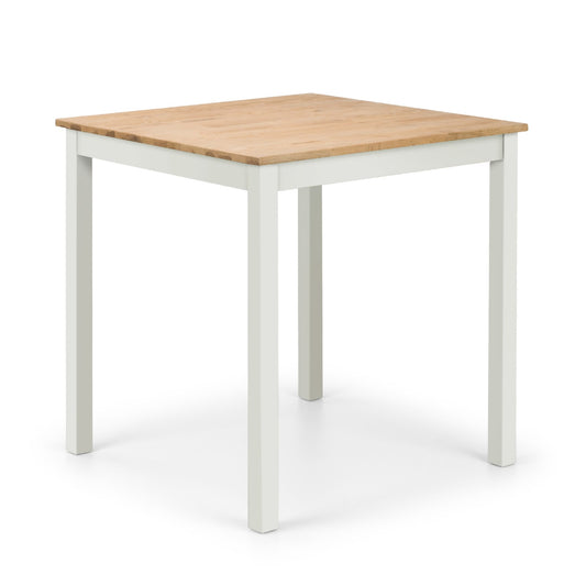 Square table with wooden top and white legs on a white background