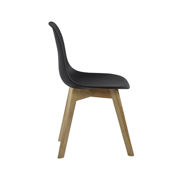 Black chair with wooden legs on a white background