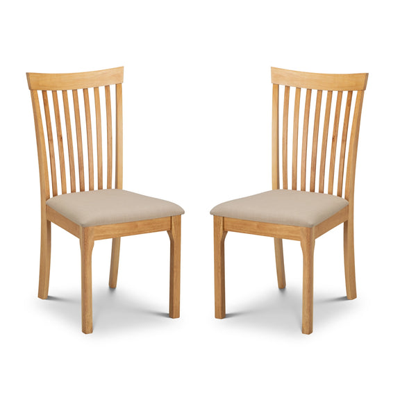 Two wooden chairs with beige seats on a white background