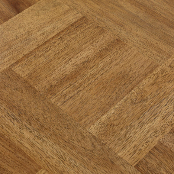 Close-up of wooden flooring with a herringbone pattern