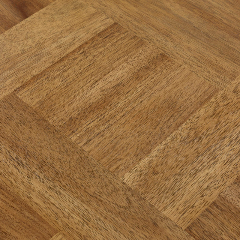 Close-up of wooden flooring with a herringbone pattern