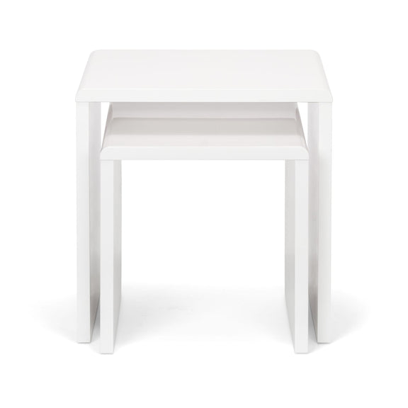 Two white nesting tables on a white background