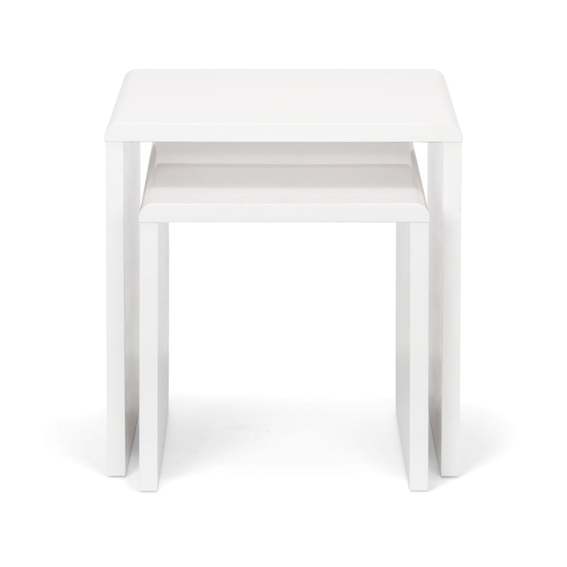 Two white nesting tables on a white background