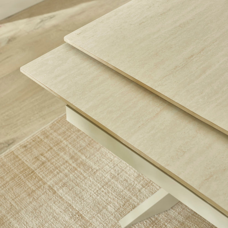 Close-up of a light wood coffee table with a neutral color palette.