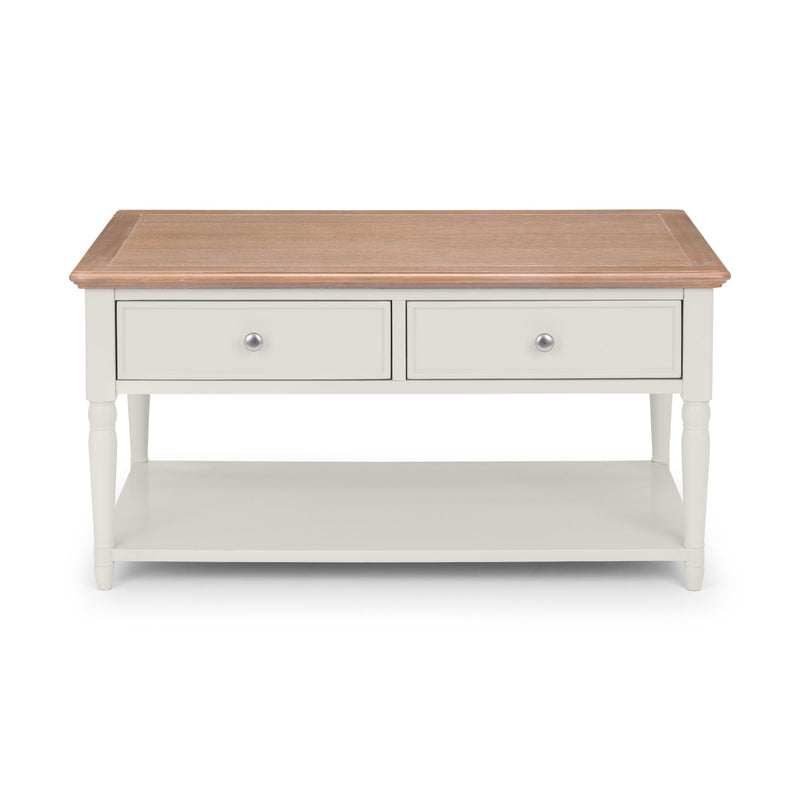 Coffee table with wooden top and white base on a white background