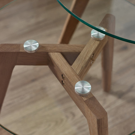 Wooden chair with glass top on a wooden floor