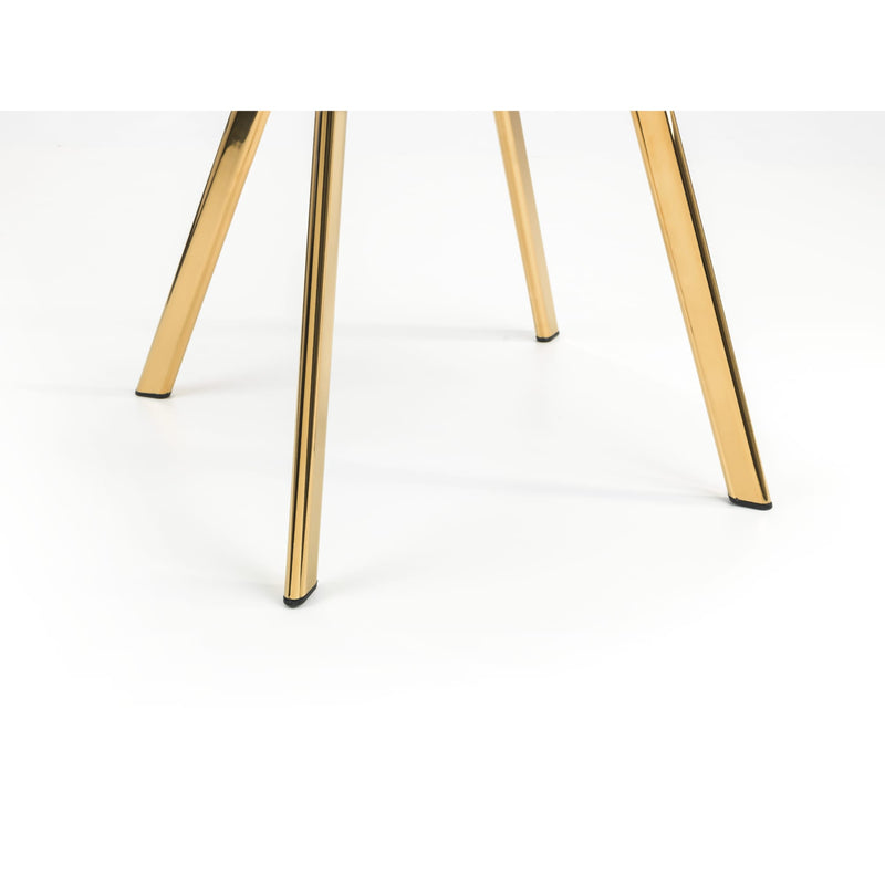 Close-up of four gold chair legs on a white background