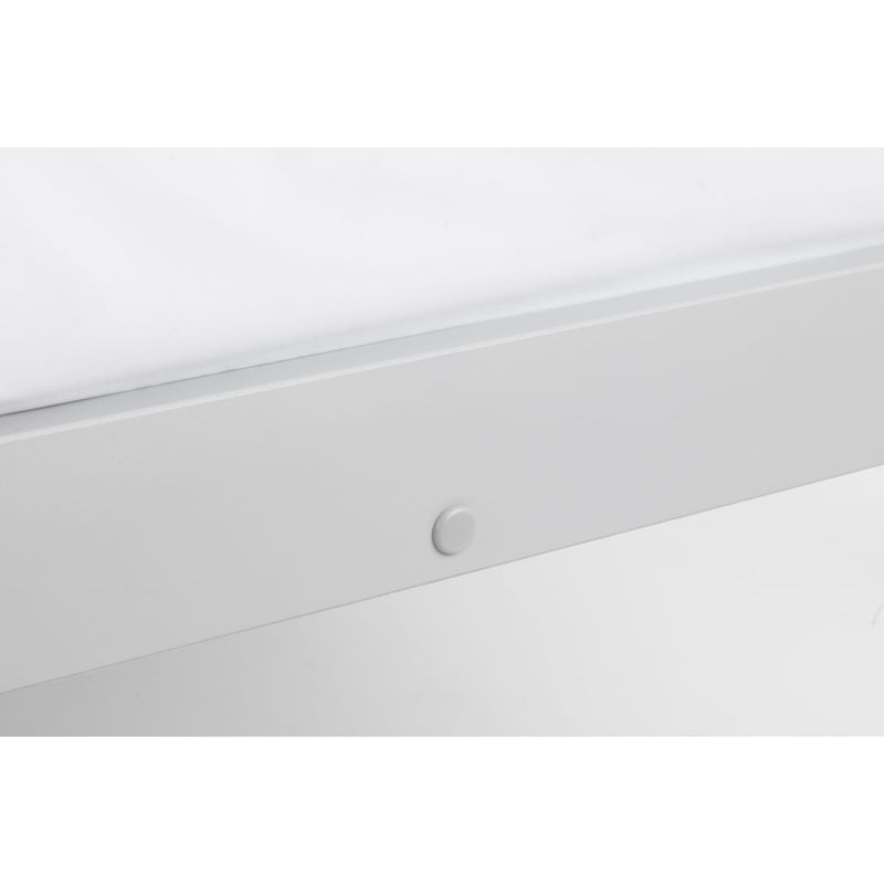 Close-up of a white ceiling light fixture with a white wall background