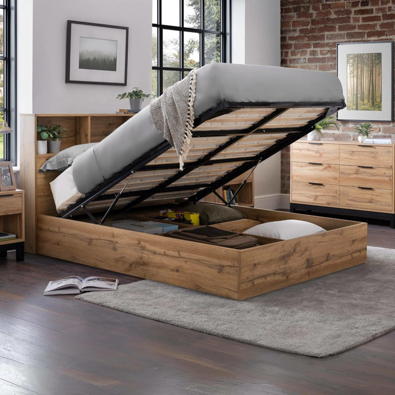 Wooden bed with storage compartments in a bedroom setting