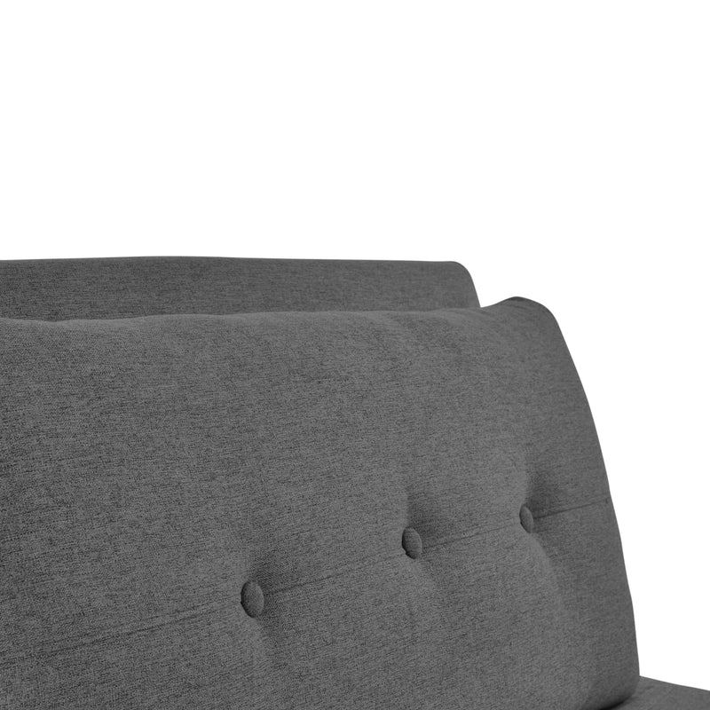 Gray upholstered headboard with tufted design on a white background
