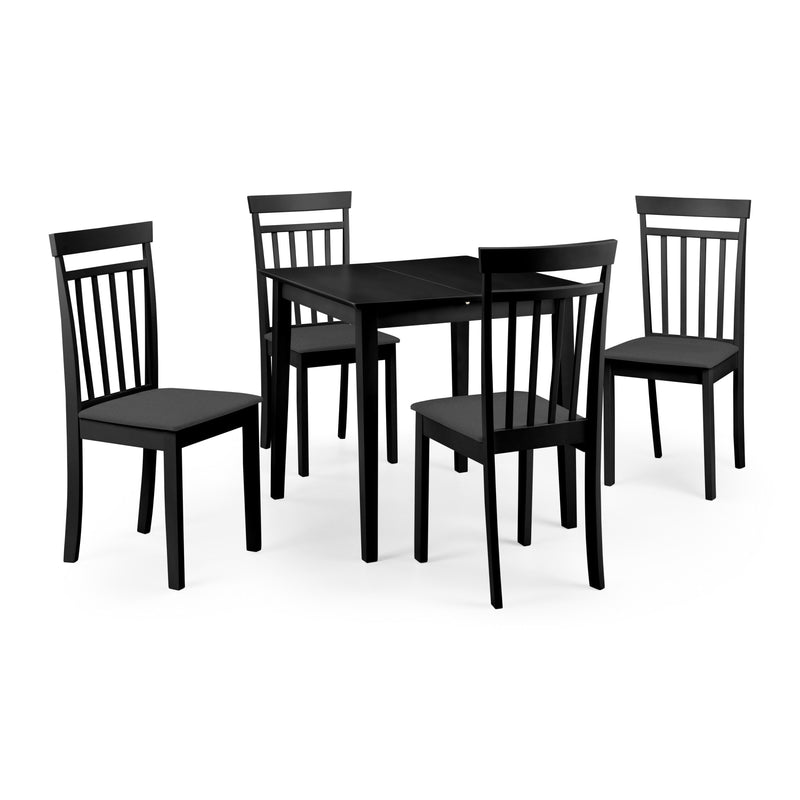Black dining table set with four chairs on a white background