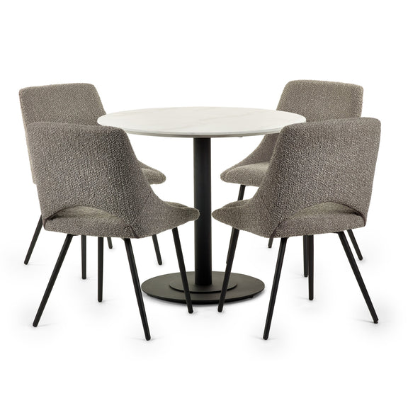 Round white table with four gray chairs on a white background