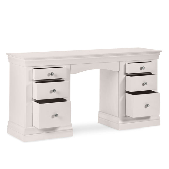 White desk with multiple drawers on a white background