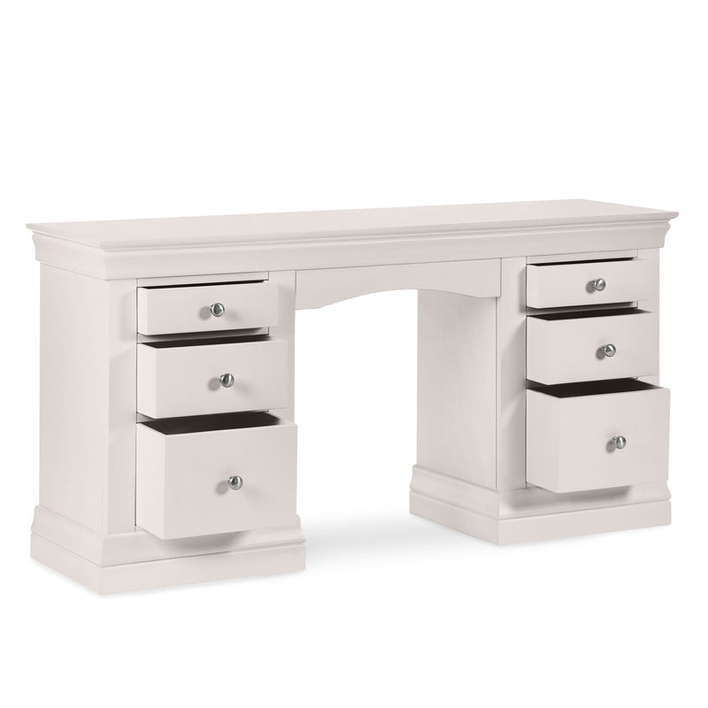 White desk with multiple drawers on a white background