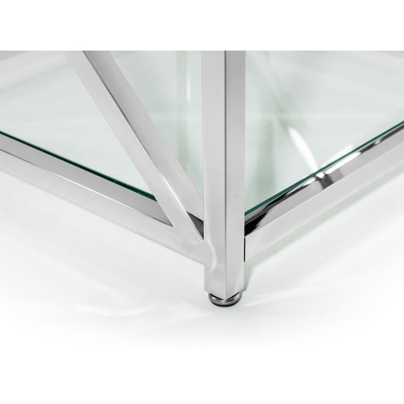 Glass table with chrome legs on a white background