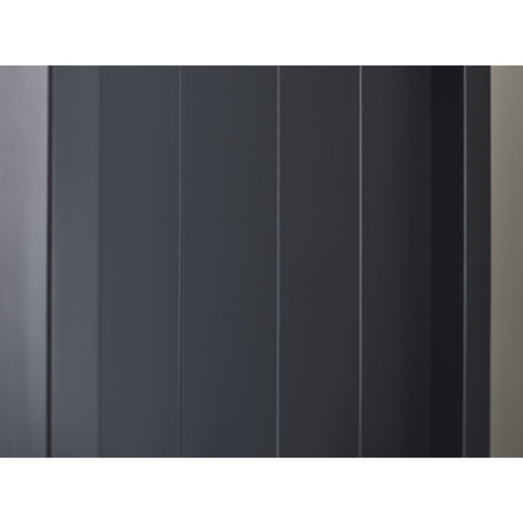Close-up of a textured black surface with vertical lines