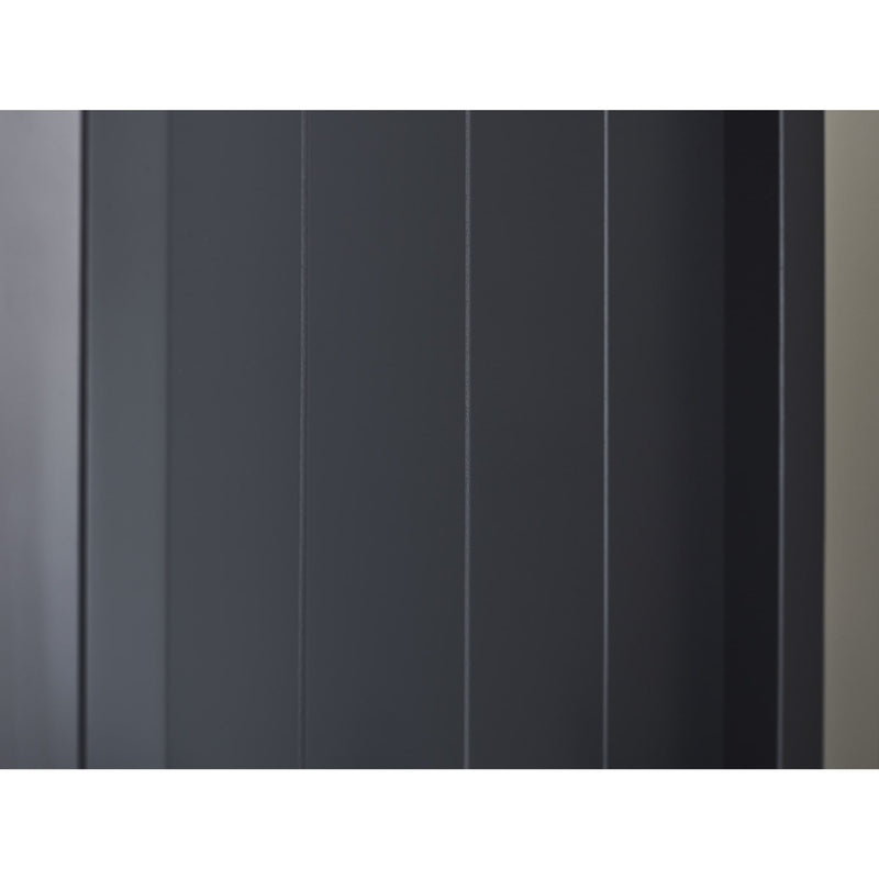 Close-up of a textured black surface with vertical lines