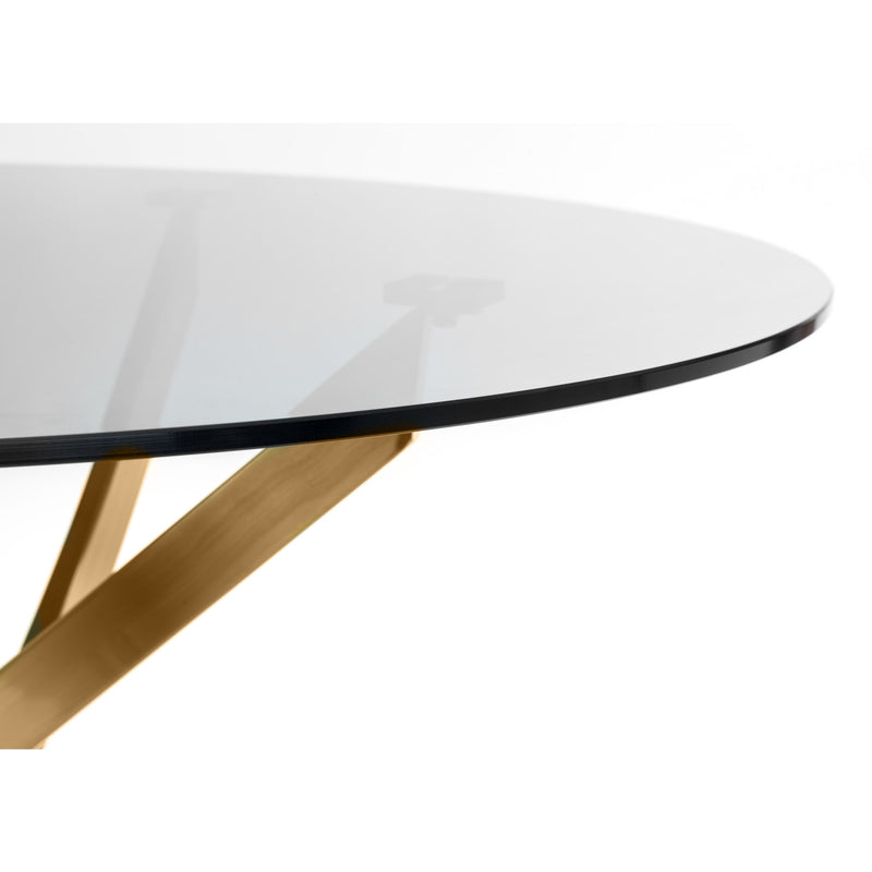 Round glass dining table with wooden legs on a white background