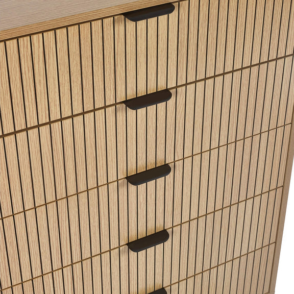 Wooden cabinet with vertical slat design and black handles on a white background