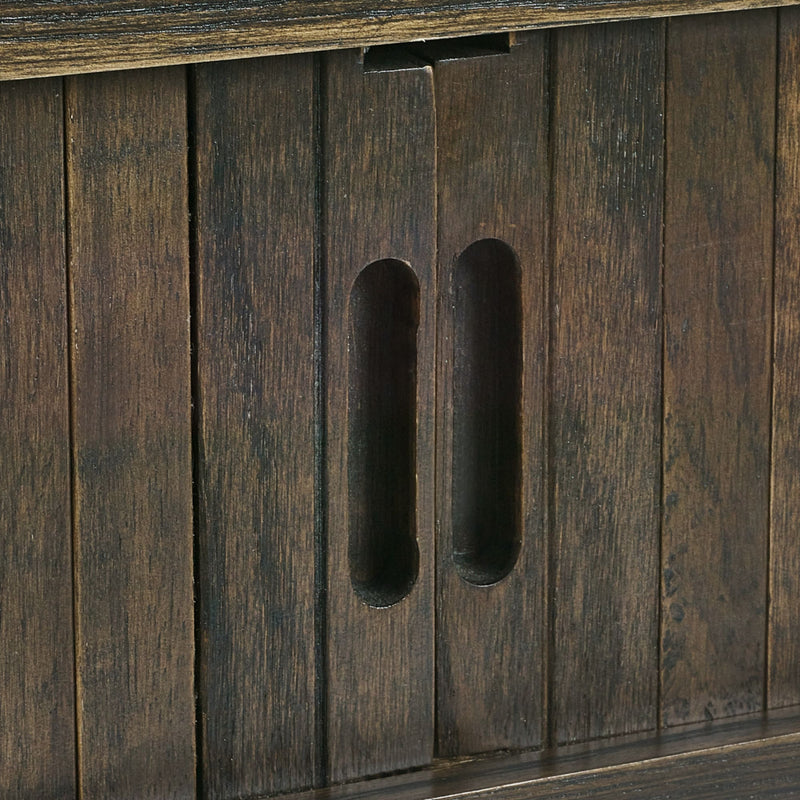 Close-up of a wooden cabinet with a handle