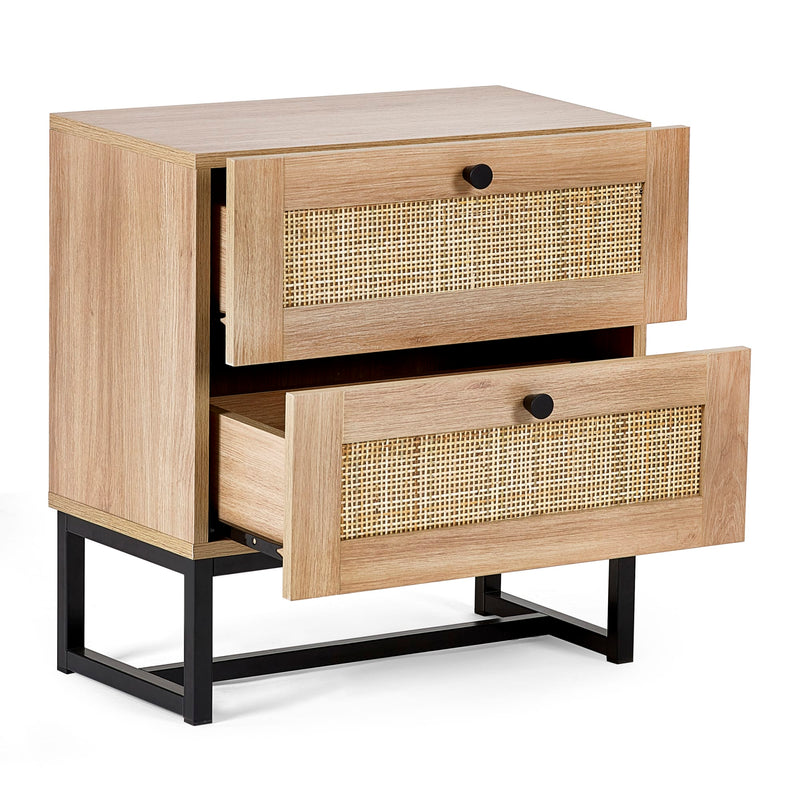 Wooden side table with two drawers and wicker panels on a white background