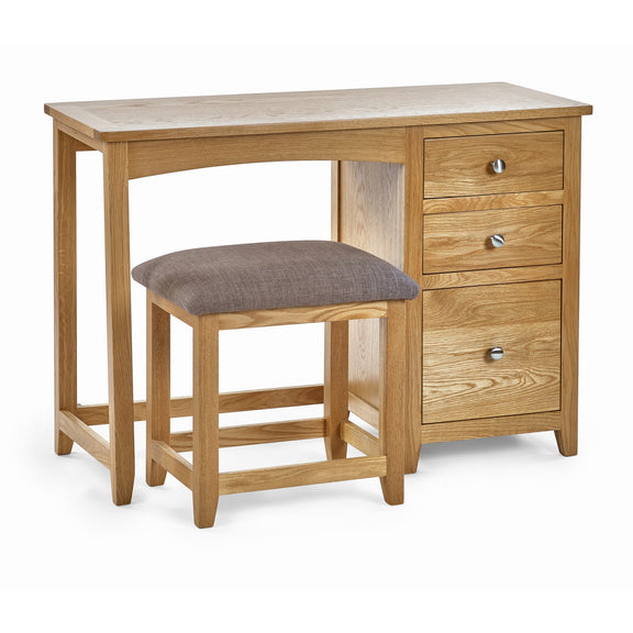 Wooden desk with a cushioned stool on a white background