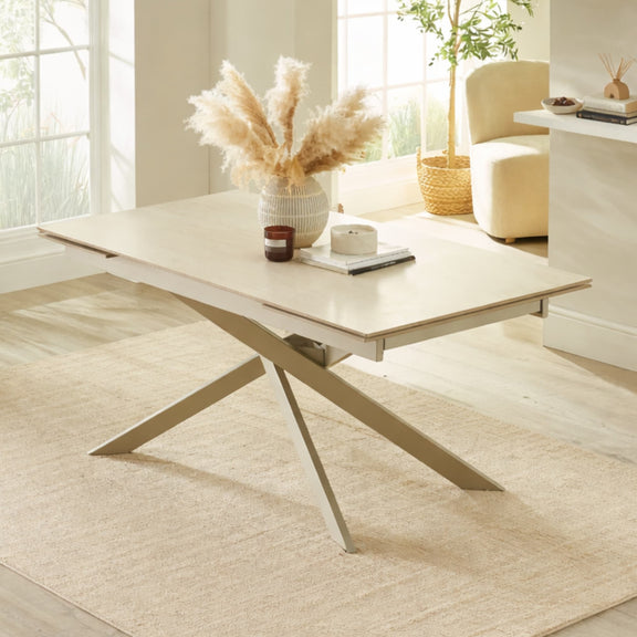 Modern coffee table with decorative items in a bright living room