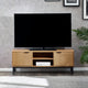 Wooden TV stand with a television on a gray wall background