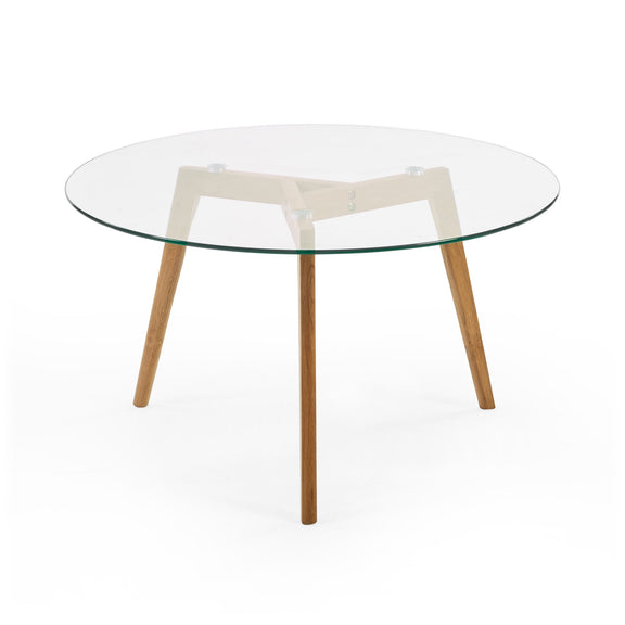 Round glass table with wooden legs on a white background