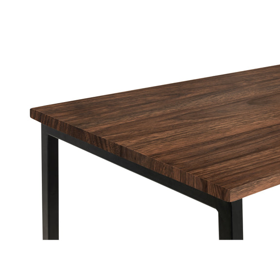 Wooden table with black metal legs on a white background