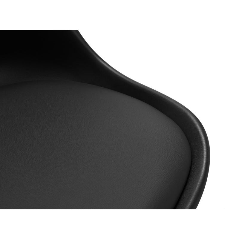 Close-up of a black chair seat on a white background